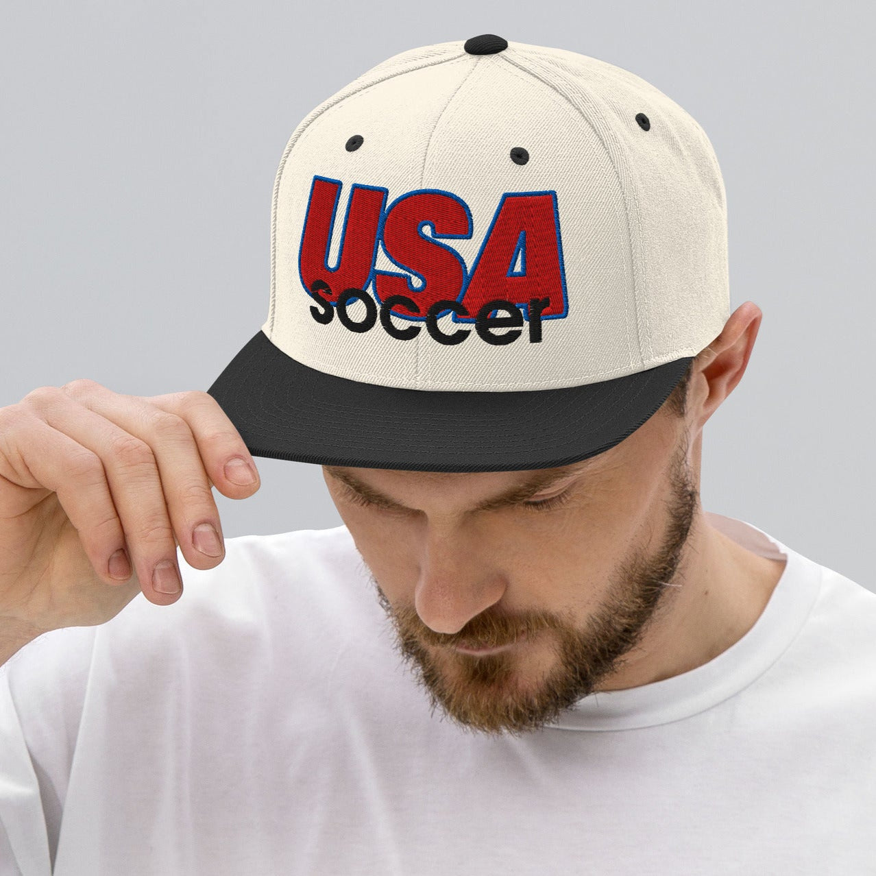 Man wearing USA soccer snapback hat