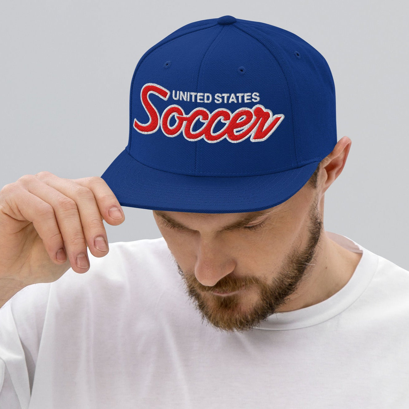 Man wearing USA soccer snapback hat